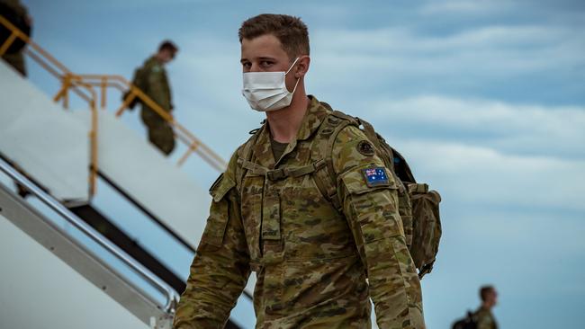 Australian Defence Force troops disembark a plane at Avalon Airport on September 11. Picture: Getty