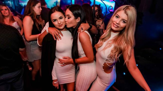 Mallory Isobel, Sophie Dim and Emma Barker at Sin City Nightclub earlier this year before its operator was locked out last week during the coronavirus shutdown.