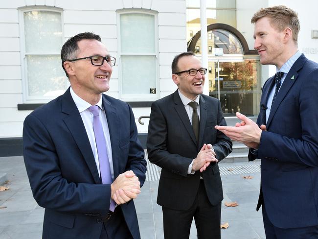 Greens leader Richard Di Natale, Greens Melbourne MP Adam Bandt and Greens candidate for Higgins Jason Ball. Picture: AAP Image/Julian Smith