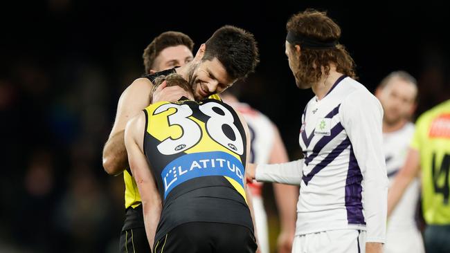 Trent Cotchin gets behind Cumberland. Photo by Michael Willson/AFL Photos via Getty Images