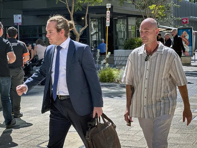 PERTH, AUSTRALIA - NewsWire Photos - 16 JANUARY, 2025: Dion Barber (R)  arrives at the Perth District Court with his lawyer for the third day of his trial. Mr Barber is suing the State of WA over allegations he was subjected to "horrific sexual abuse" while a ward of the state in the 1980s and 90s. Picture: NewsWire / Emma Kirk