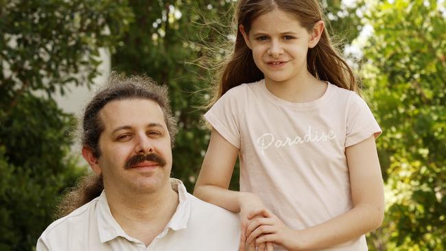 DAILY TELEGRAPH MARCH 16, 2025. Ben Green and his children Stan and Elizabeth rely on Concerta and have had their lives disrupted by the ADHD medication shortage. They now take ritalin but because it's short released it makes life harder. Ben Green pictured with his daughter Elizabeth at home in Jordan Springs. Picture: Jonathan Ng