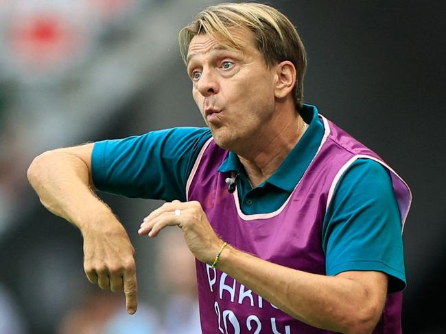 Australia's Swedish coach Tony Gustavsson reacts from the sidelines in the women's group B football match between Australia and Zambia during the Paris 2024 Olympic Games at the Nice Stadium in Nice on July 28, 2024. (Photo by Valery HACHE / AFP)