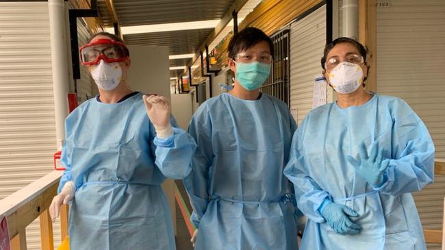 Medical student Will Lin (centre) along with two nurses at Wise respiratory clinic in Macquarie Park. Picture: Supplied