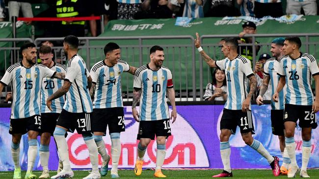 Lionel Messi celebrates with his teammates. Picture: AFP