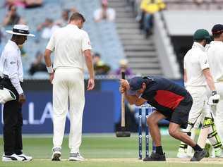 A groundsman works on the MCG pitch during the Boxing Day Test. Picture: Julian Smith