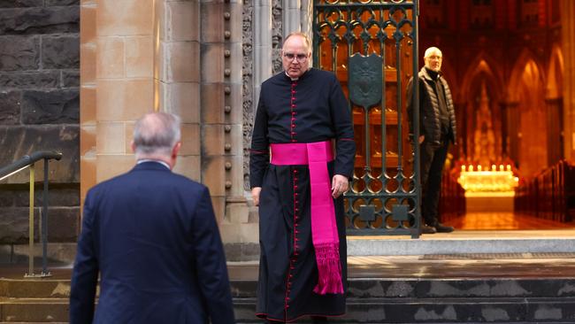 The Prime Minister was greeted by St Patrick’s Cathedral’ Dean Monsignor Stuart Hall on Tuesday morning. Picture: Mark Stewart / NewsWire
