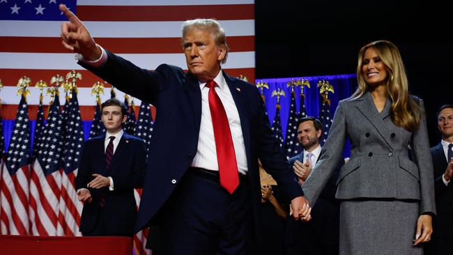 Donald Trump with former first lady Melania Trump during an election night event at the Palm Beach Convention Centre.