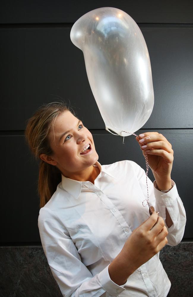 Celia Morrison tries one of the delicacies flavoured with raspberry. Picture: Toby Zerna