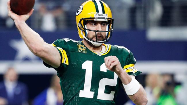 ARLINGTON, TX - JANUARY 15: Aaron Rodgers #12 of the Green Bay Packers throws a pass in the first half during the NFC Divisional Playoff Game against the Dallas Cowboys at AT&amp;T Stadium on January 15, 2017 in Arlington, Texas. Joe Robbins/Getty Images/AFP == FOR NEWSPAPERS, INTERNET, TELCOS &amp; TELEVISION USE ONLY ==