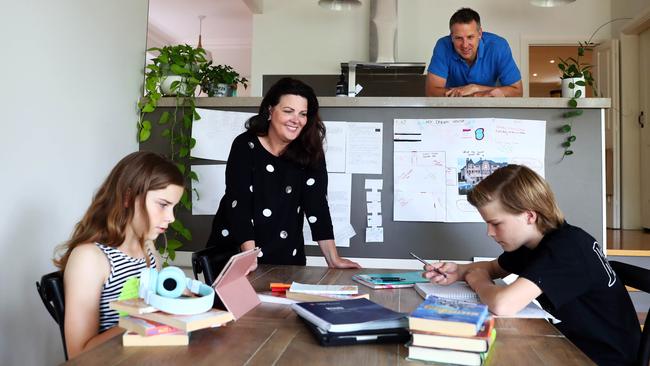 Jane Plunkett and Matthew Zbaracki with their home-schooling children Emma and Oliver at home in Montmorency. Picture: Aaron Francis