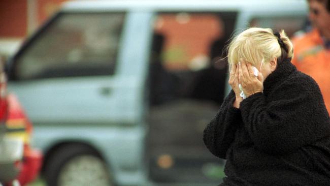 Judy Moran, the mother of Jason Moran, weeps at the scene of her son’s murder.