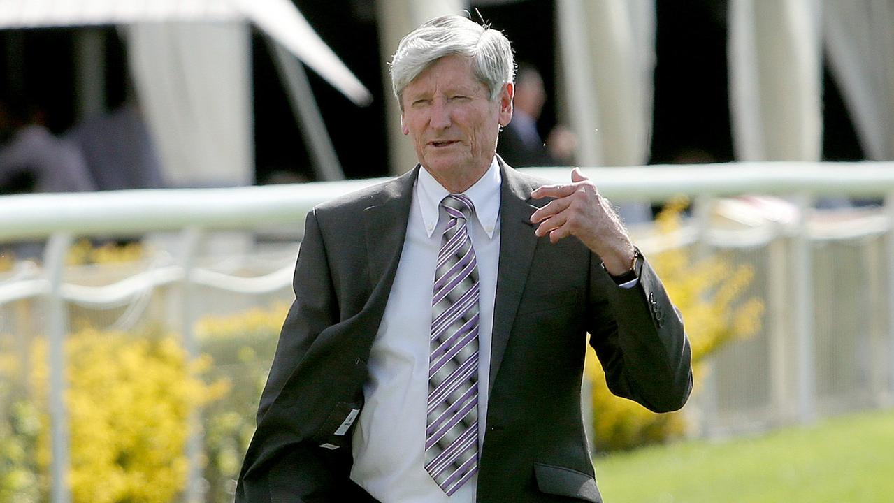 Cheif Steward Allan Reardon walking on the track - an ambulance had mechanical problems, delaying race 4, Sono Restaurant Open Handicap at Doomben Racecourse. Pic Mark Cranitch.