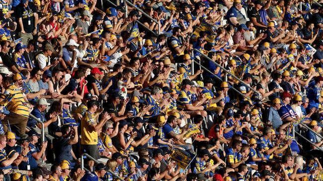 Eels fans celebrating at the first NRL match between the Parramatta Eels and Wests Tigers at the new Bankwest Stadium at Parramatta. Picture: Jonathan Ng