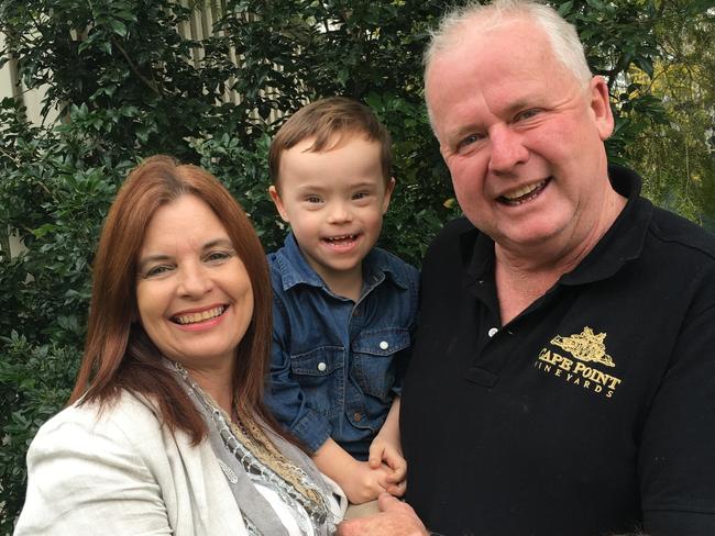 Sue and Neil Coutts with their adopted son Russell. Picture: Supplied