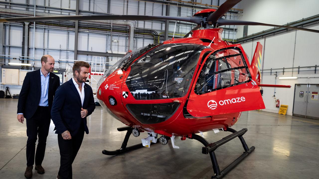 Prince William, Prince of Wales (left) with David Beckham viewing one of the new London Air Ambulance Charity helicopters. Picture: Getty