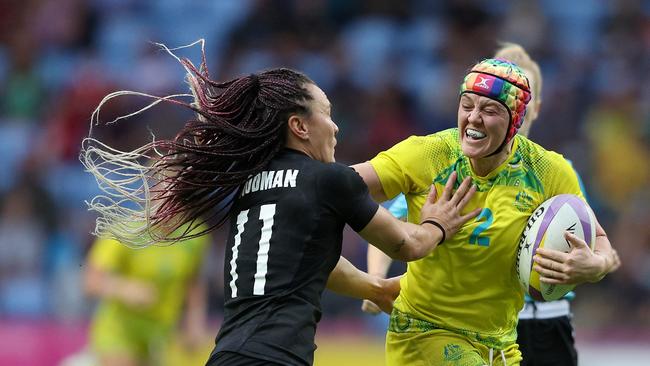 Sharni Williams holds off Portia Woodman in Australia’s semi final victory over New Zealand. Picture: Richard Heathcote/2022 Getty Images