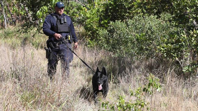 Senior Constable Joseph Alofipo with his dog Bravo ready to track. Picture Glenn Hampson