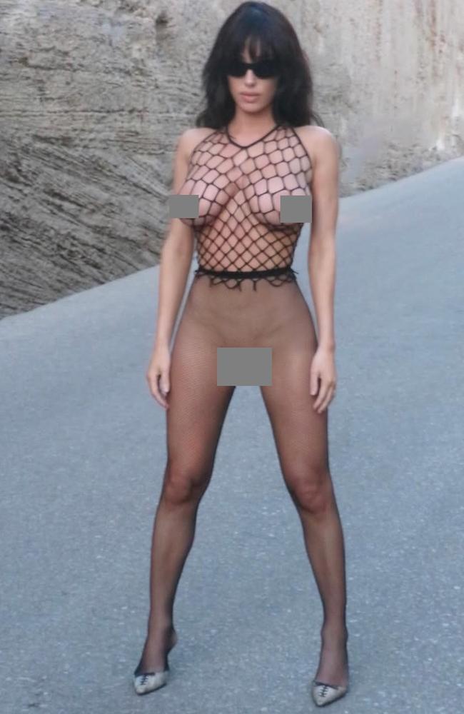 She wore a fishnet top and sheer tights with nothing underneath. Picture: Instagram