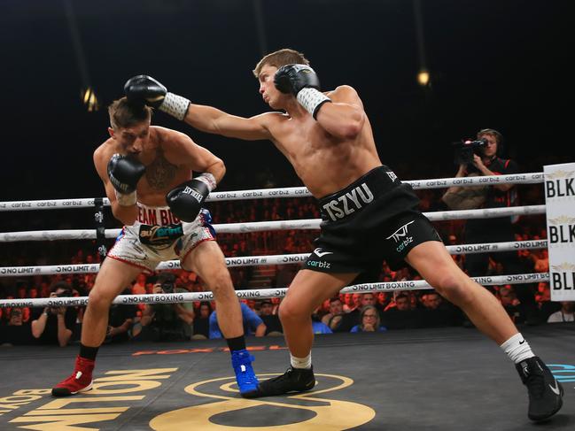 Tszyu lands a jab on Biggs. Picture: No Limit Boxing