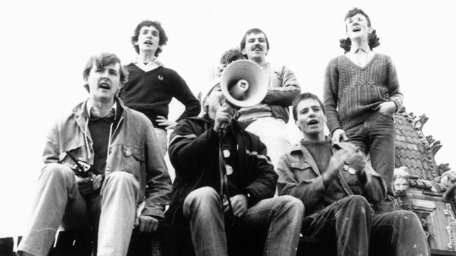 A young Anthony Albanese, left, leads students in a protest atop the University of Sydney clock tower.