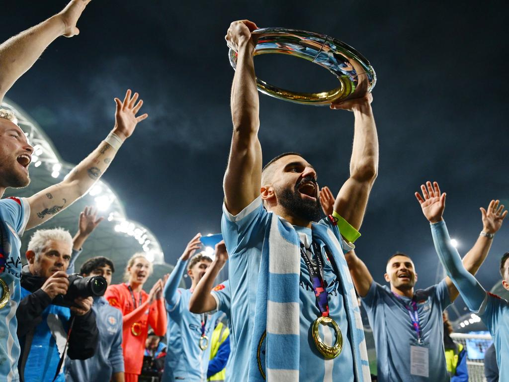 Aziz Behich holds aloft the A-League Men Championship trophy after winning the A-League Grand Final. Picture: Getty Images