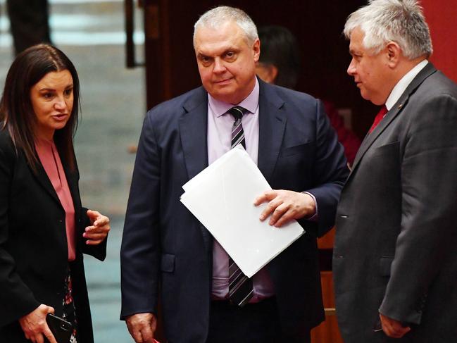 CANBERRA, AUSTRALIA - MARCH 18: Senator Jacqui Lambie,  Senator Stirling Griff and Senator Rex Patrick during debate of the Fair Work Amendment Bill 2021 in the Senate at Parliament House on March 18, 2021 in Canberra, Australia. Senator GriffÃÂ has issued a statement confirming that Centre Alliance only supports changes to casuals provisions and wage theft and will not support the rest of the Industrial Relations omnibus bill. (Photo by Sam Mooy/Getty Images)