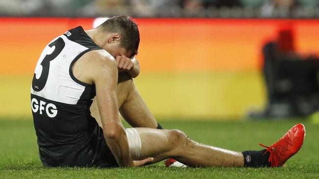 Ryan Burton after tearing his hamstring against Brisbane. Picture: Daniel Pockett/Getty Images