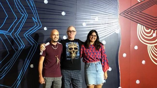 Artist Birrunga Wiradyuri, centre, with Kate Brunjes and Stevie O’Chin, standing in front of the blue-banded bee mural.