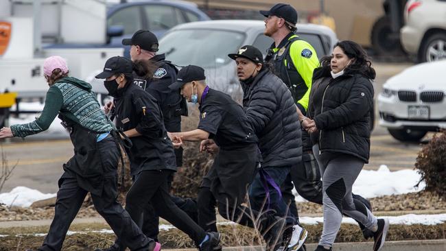 Shoppers flee from King Soopers after a mass shooting on Monday. Picture: Chet Strange/Getty Images/AFP