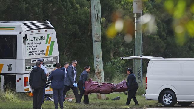 Mr Leonello’s body was removed from the scene. Picture: Richard Dobson