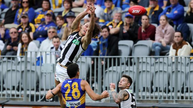 Collingwood’s Darcy Moore flies high but drops the mark against West Coast Eagles at Optus Stadium. Picture: Getty Images