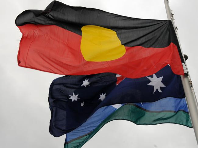 Three Australian flags the Torres Strait, Australia and Aboriginal flags