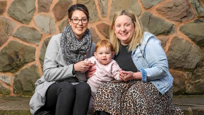 Danielle Snelling and Eloise Baker-Hughes with daughter Matilda. Picture: Tim Carrafa