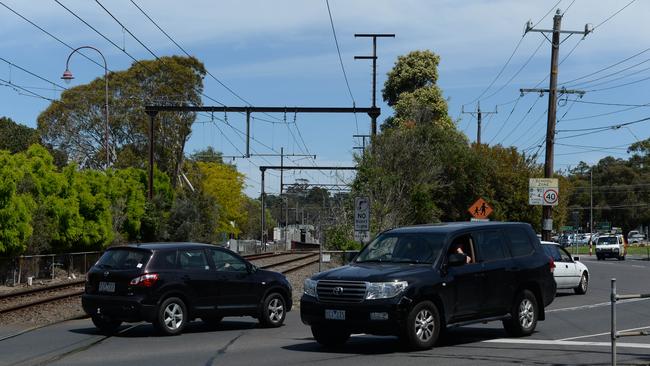 The Coolstore Rd level crossing. Picture: AAP/ Chris Eastman