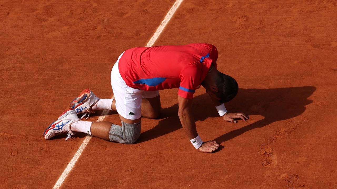 Novak Djokovic celebrates match point. (Photo by Matthew Stockman/Getty Images)