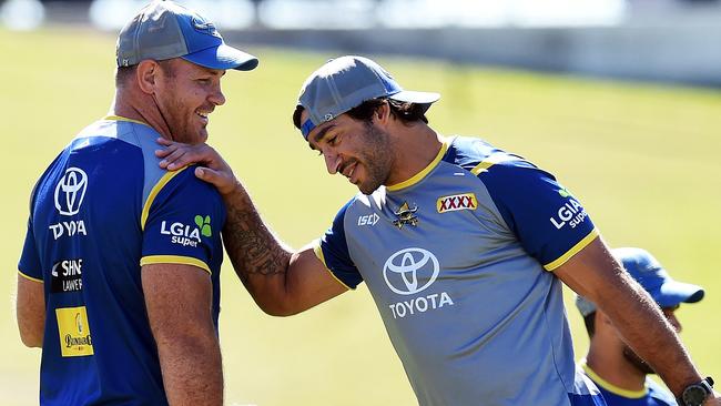 Matt Scott and Johnathan Thurston. Photo: Zak Simmonds