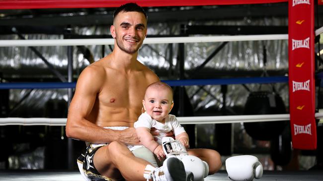 Andrew Moloney with son Lee. Picture: Adam Head