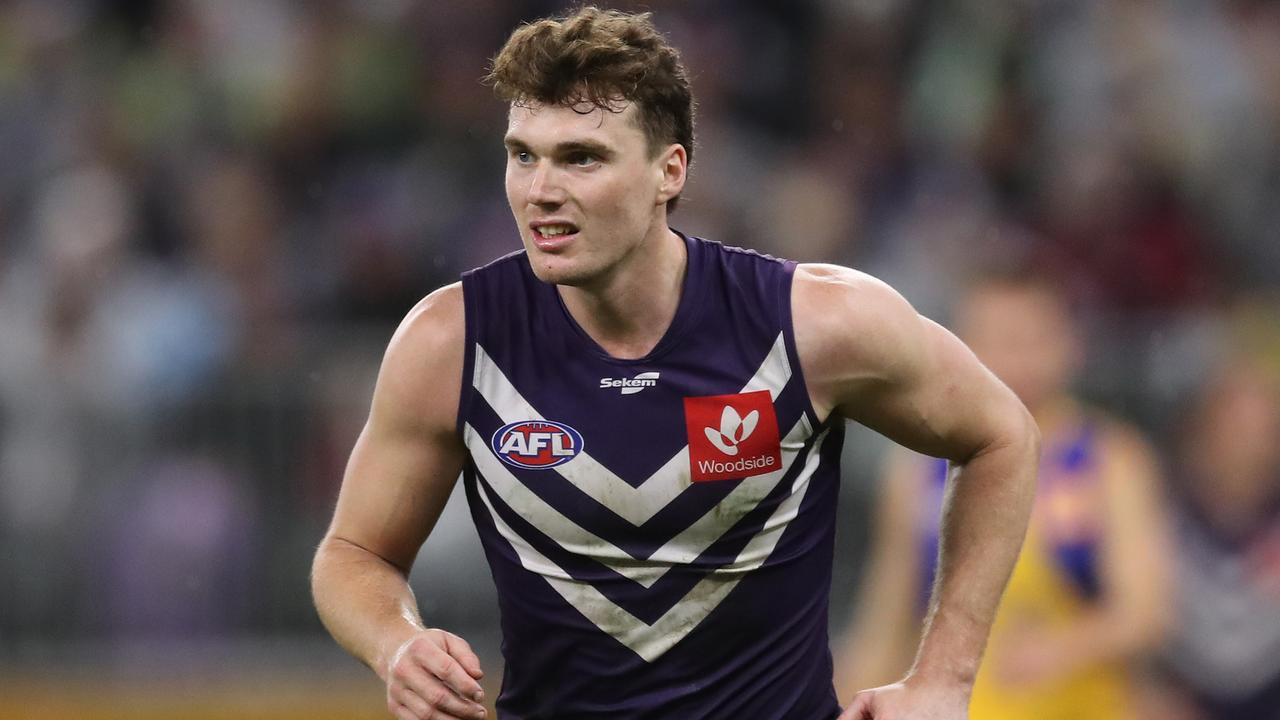 PERTH, AUSTRALIA - AUGUST 13: Blake Acres of the Dockers looks on during the 2022 AFL Round 22 match between the Fremantle Dockers and the West Coast Eagles at Optus Stadium on August 13, 2022 in Perth, Australia. (Photo by Will Russell/AFL Photos via Getty Images)