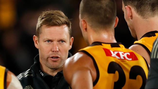 Sam Mitchell, Senior Coach of the Hawks addresses his players during the 2022 AFL Round 08 match between the Essendon Bombers and the Hawthorn Hawks at Marvel Stadium on May 07, 2022 in Melbourne, Australia.