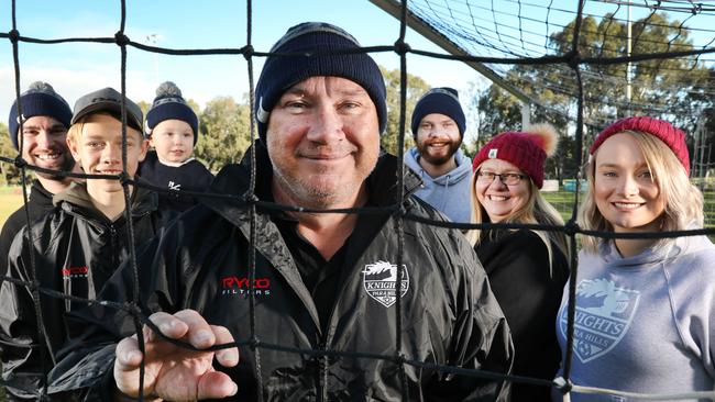 Para Hills Knights junior assistant coach Shane Hillman, (centre) who is terminally ill with brain cancer, alongside son-in-law Jamie Banwell, son Josh, grandson Chase, son Shaun, wife Deb, and daughter Jenna. Picture: AAP Image/Dean Martin.