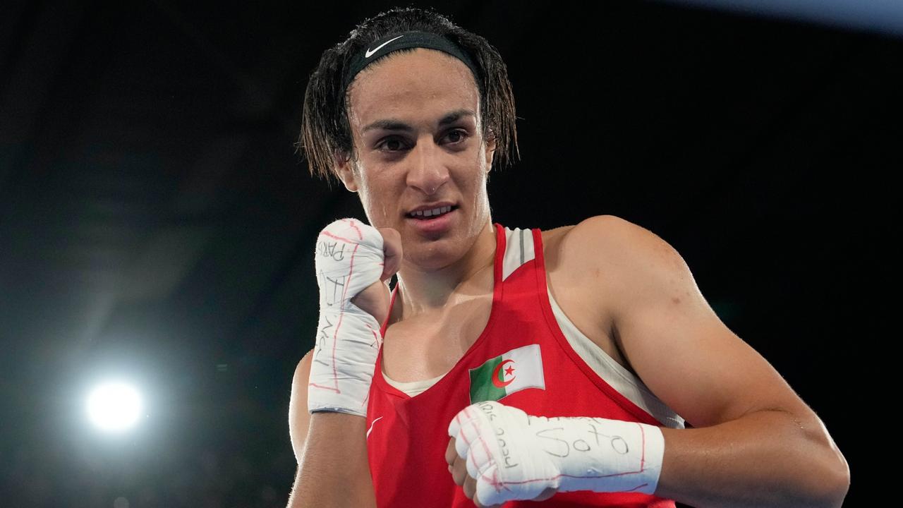 Imane Khelif poses after defeating China's Yang Liu to win gold. AP Photo/Ariana Cubillos.