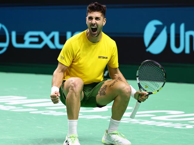 MALAGA, SPAIN - NOVEMBER 21: Thanasi Kokkinakis of Team Australia celebrates victory after defeating Ben Shelton of Team USA during the Davis Cup Quarter Final match betwen USA and Australia at Palacio de Deportes Jose Maria Martin Carpena on November 21, 2024 in Malaga, Spain. (Photo by Matt McNulty/Getty Images for ITF) *** BESTPIX ***