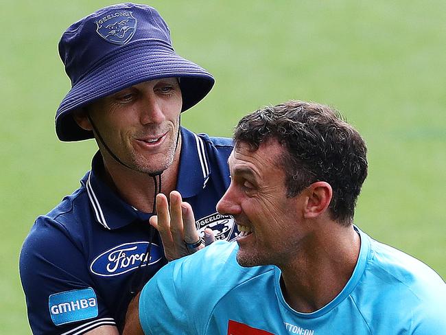 Harry Taylor tussles with Nigel Lappin at Geelong Cats training. Picture: Alison Wynd