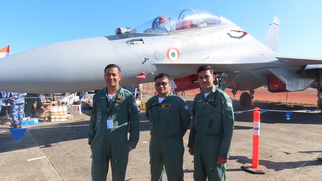 Indian aviators standing before their Su-30MKI Flanker jet.