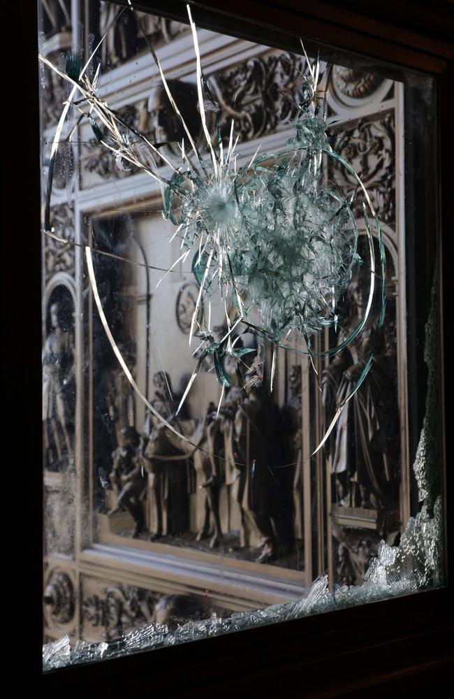 Damage is seen on an entrance of the U.S. Capitol. Picture: Getty