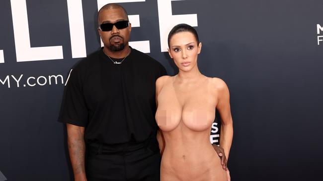 PIXELATED VERSIONS -  LOS ANGELES, CALIFORNIA - FEBRUARY 02: (EDITOR'S NOTE: Image contains nudity.) L-R, Kanye West and Bianca Censori attend the 67th Annual GRAMMY Awards on February 02, 2025 in Los Angeles, California.  (Photo by Matt Winkelmeyer/Getty Images for The Recording Academy)