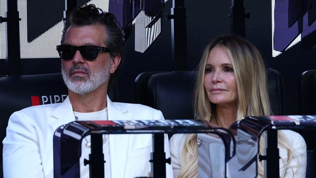 Doyle Bramhall and Elle Macpherson at Melbourne Park.