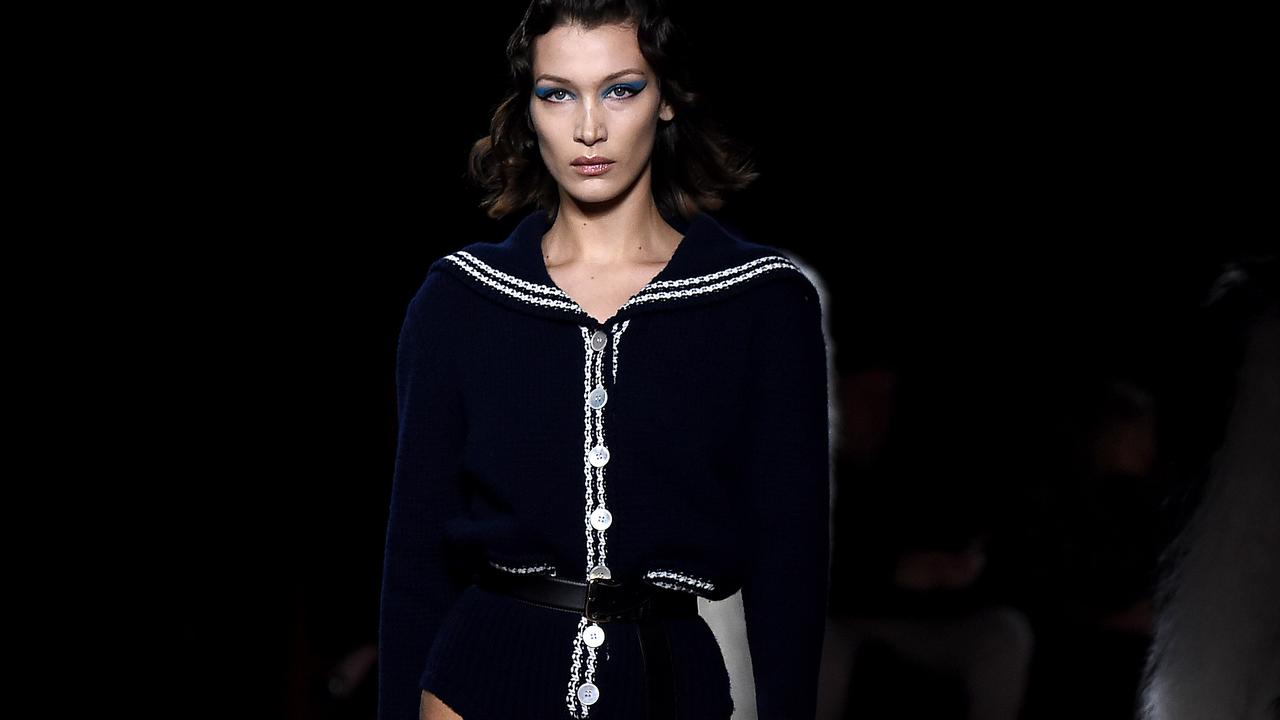 Bella Hadid stuns in navy crop top at Louis Vuitton's Paris Fashion Week  Men's show