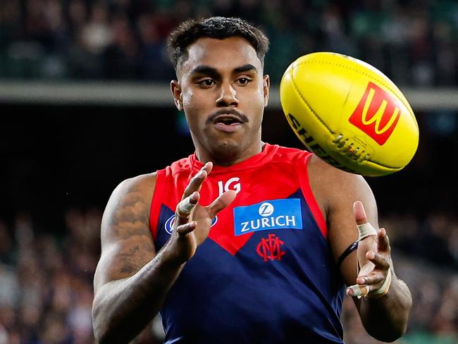 MELBOURNE, AUSTRALIA - AUGUST 23: Kysaiah Pickett of the Demons gathers the ball during the 2024 AFL Round 24 match between the Melbourne Demons and the Collingwood Magpies at The Melbourne Cricket Ground on August 23, 2024 in Melbourne, Australia. (Photo by Dylan Burns/AFL Photos via Getty Images)